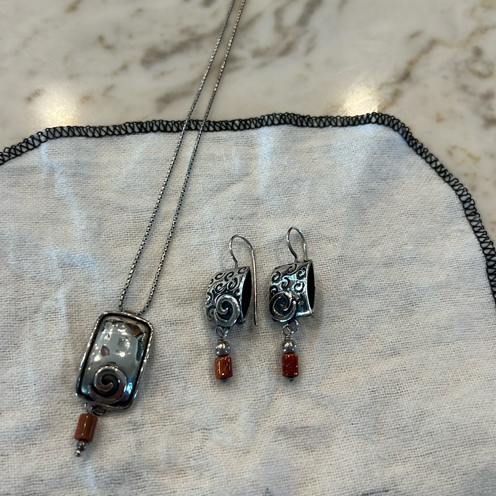 Swirly Silpada silver necklace and earrings